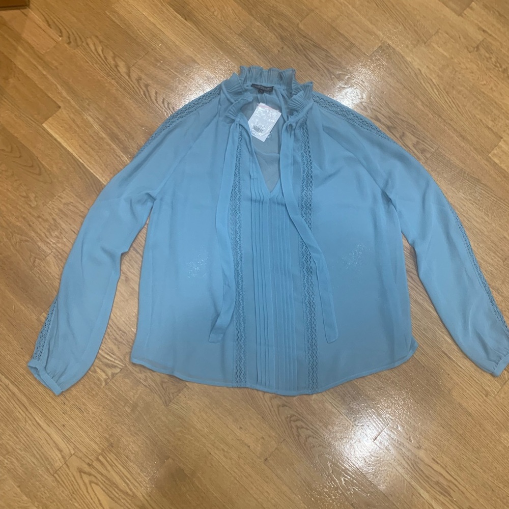 Top shop feminine blouse with a bow